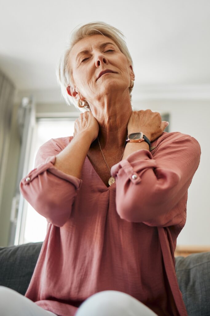 woman experiencing neck pain
