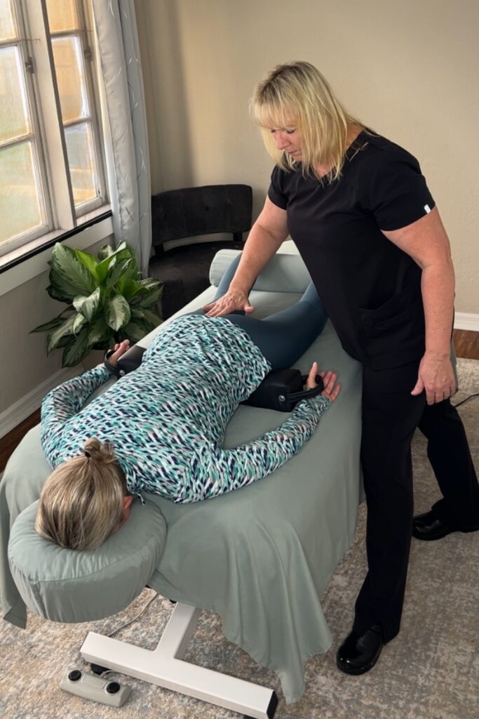 woman receiving massage and bodywork